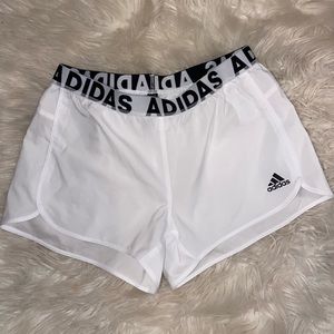 White athletic adidas shorts
